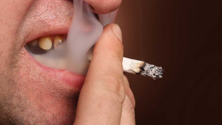 The Impact of Smoking and Vaping on Oral Health: Risks and Consequences